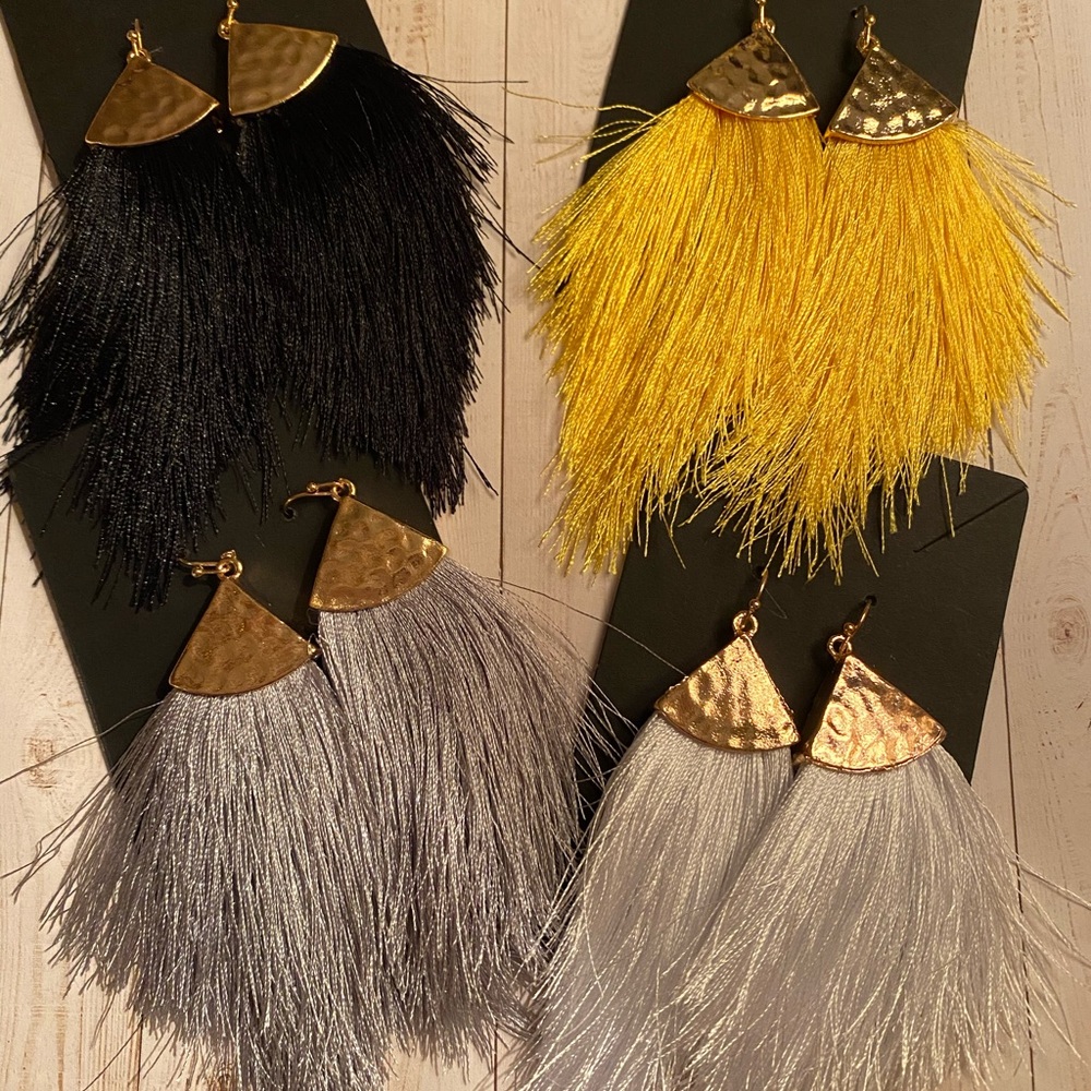 4 pairs feather earrings brand new